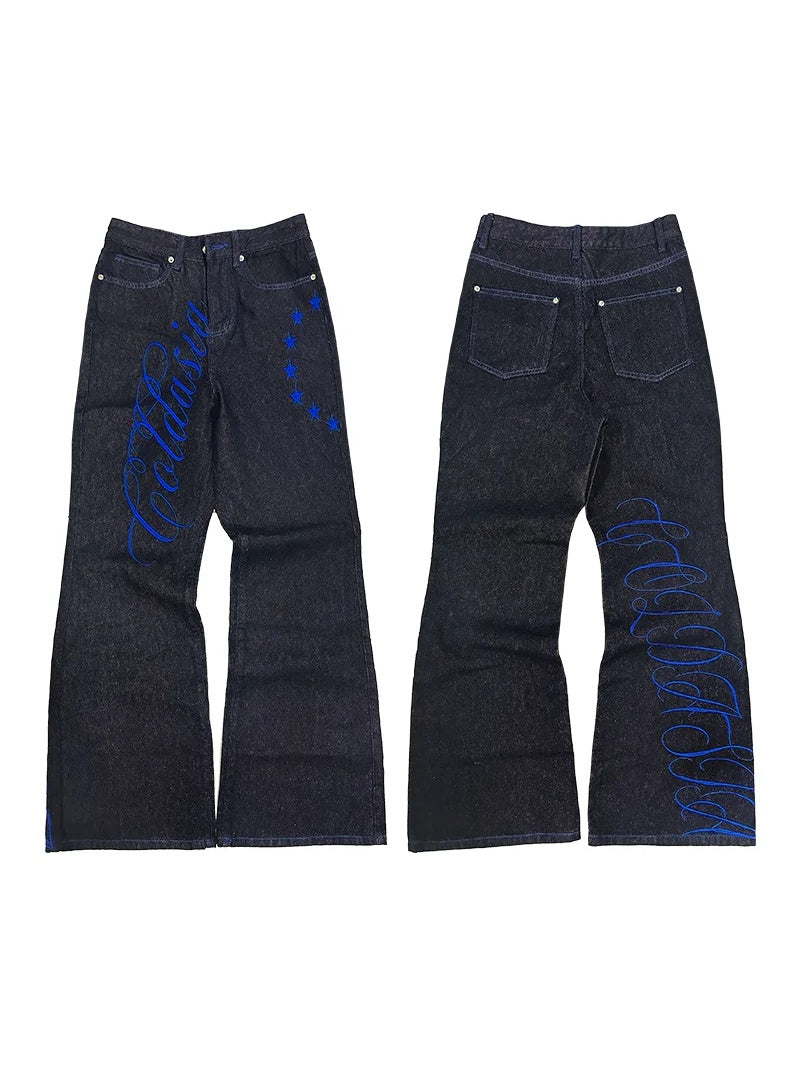 Script Embroidered Star Raw Denim Flare Jeans - Black flat lay front and back