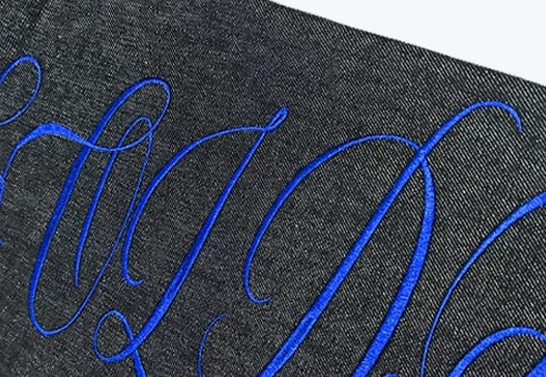 Script Embroidered Star Raw Denim Flare Jeans - Black back script embroidery detail