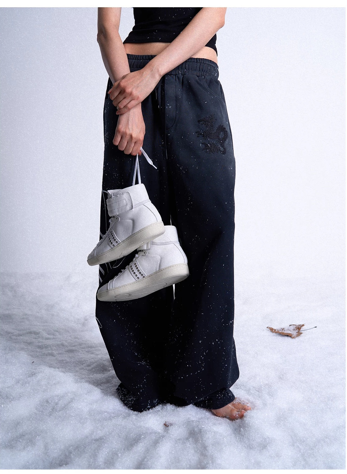 noEmosen Studded Leather High-Top Sneakers - White held in hand - lookbook