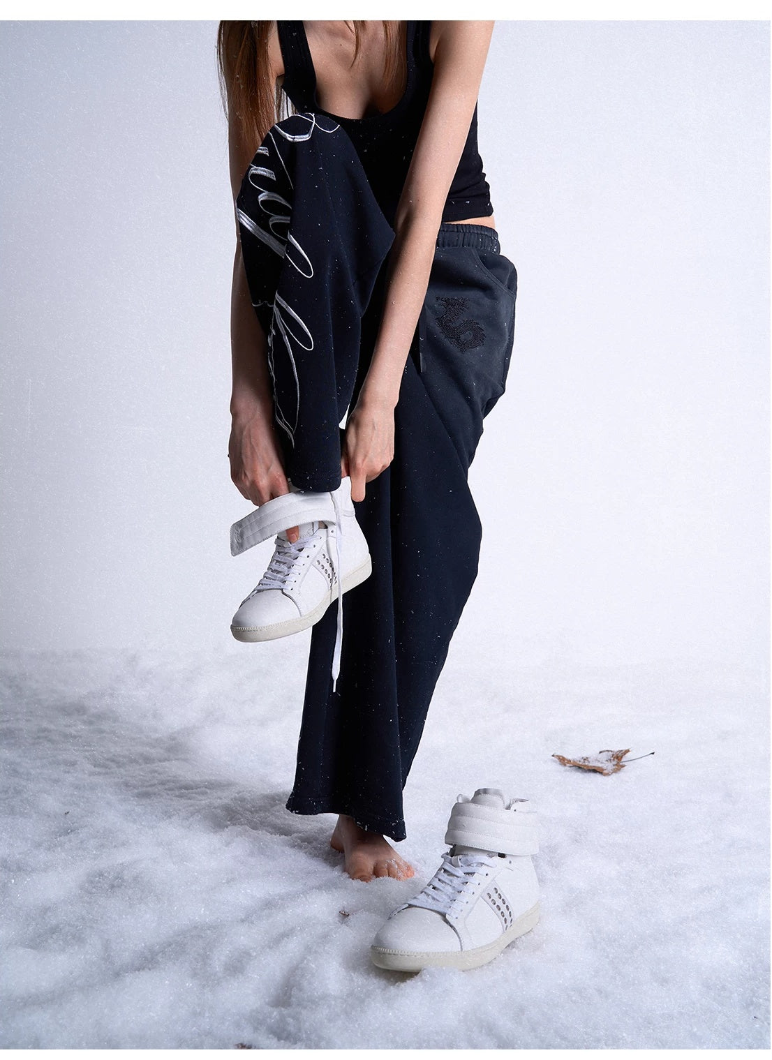 noEmosen Studded Leather High-Top Sneakers - White worn with wide-leg pants - lookbook